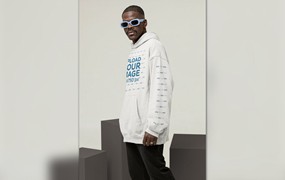 连帽衫设计展示酷男模特样机图 Mockup of a Cool Man Wearing a Hoodie