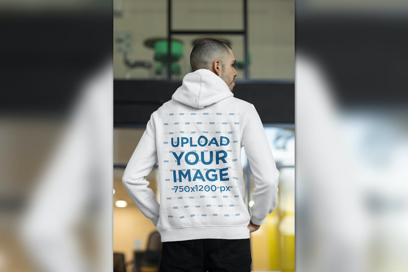 办公室男性背影连帽衫设计样机图 Back View of a Man Wearing a Hoodie at The Office 样机素材 sucaiwan.com